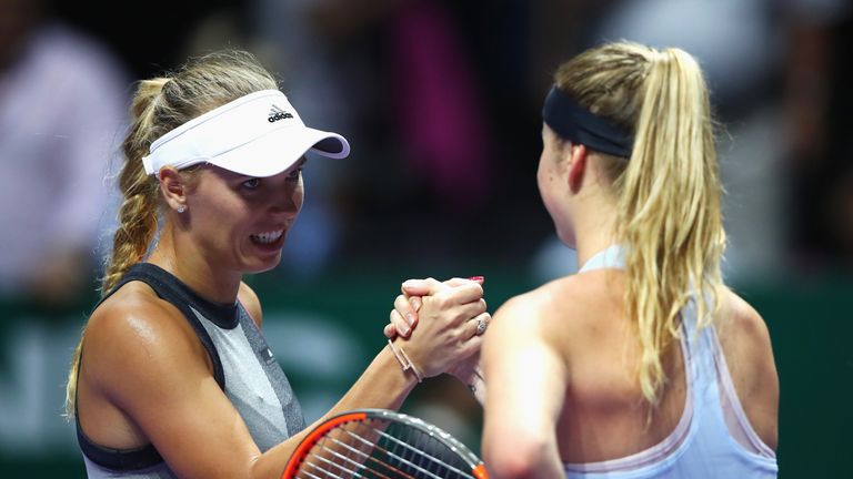 SINGAPORE - OCTOBER 23:  Caroline Wozniacki of Denmark shakes hands with Elina Svitolina of Ukraine after her victory in their singles match during day 2 o
