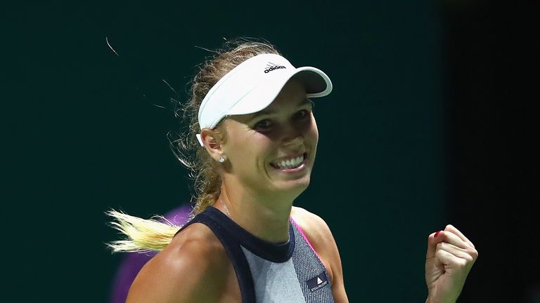 SINGAPORE - OCTOBER 23:  Caroline Wozniacki of Denmark celebrates victory in her singles match against Elina Svitolina of Ukraine during day 2 of the BNP P