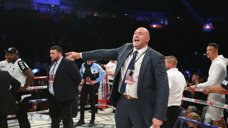 MANCHESTER, ENGLAND - SEPTEMBER 23:  Tyson Fury rants at a member of the British Boxing Board of Control after the WBO World Heavyweight Title fight betwee