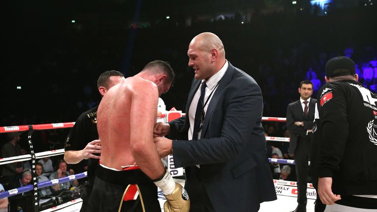 MANCHESTER, ENGLAND - SEPTEMBER 23:  Tyson Fury embraces Hughie Fury after the WBO World Heavyweight Title fight at Manchester Arena on September 23, 2017 