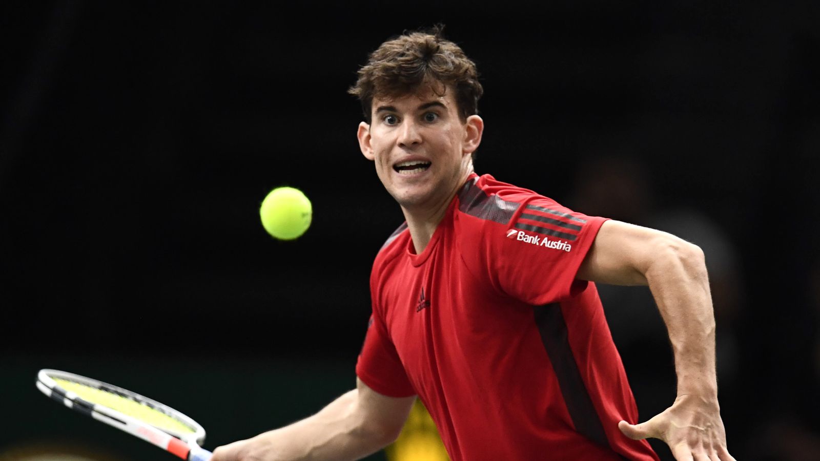 Dominic Thiem improvises a hotdog return from Fernando Verdasco's serve