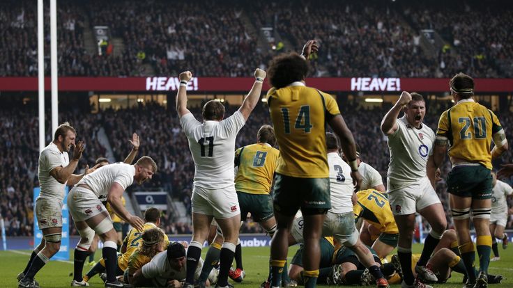 England players celebrate after England No. 8 Ben Morgan (3rd L) scores his second try from a rolling maul during the Autumn International rugby union Test