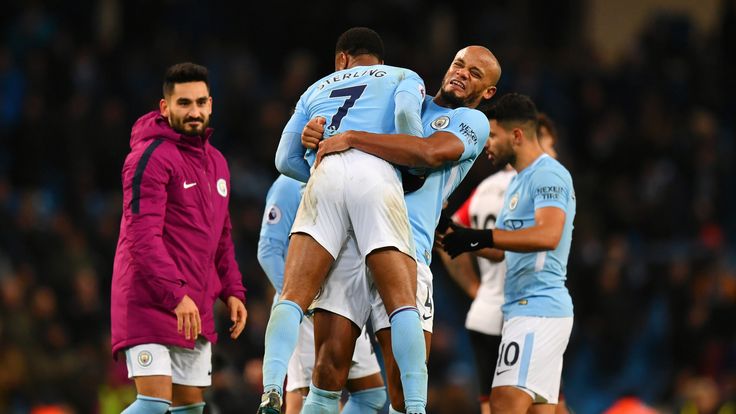 Raheem Sterling of Manchester City celebrates victory with Vincent Kompany after the Premier League clash with Southampton