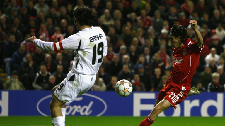 Yossi Benayoun scores his first of three goals in Liverpool's record 8-0 win against Besiktas