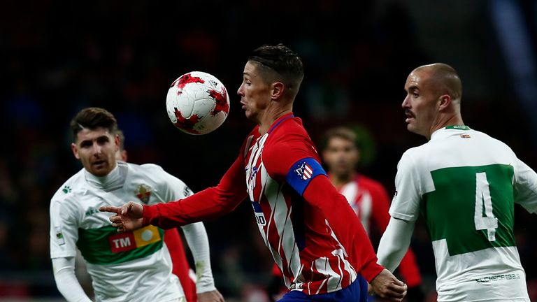 Former Liverpool and Chelsea striker Fernando Torres scored twice as Atletico Madrid beat Elche 3-0