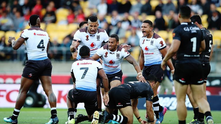 Fiji celebrate after notching the decisive penalty against New Zealand in the quarter-final of the World Cup
