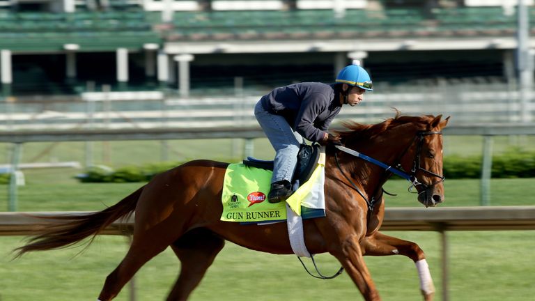 LOUISVILLE, KY - APRIL 29:  Gun Runner runs on the track during morning training for the 2016 Kentucky Derby at Churchill Downs on April 29, 2016 in Louisv