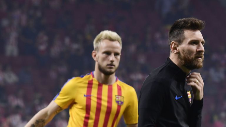 Ivan Rakitic (left) thinks Lionel Messi will stay at Barcelona beyond the summer