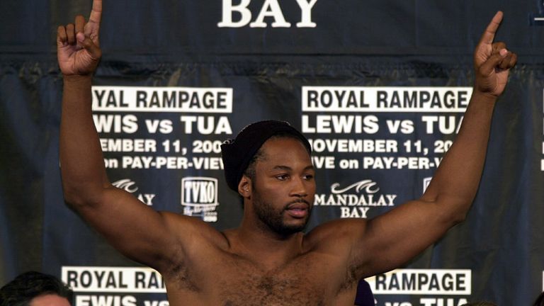 NEVADA, UNITED STATES - NOVEMBER 10:  World heavyweight champion Lennox Lewis tips the scales at 249 pounds at the official weigh in prior to his world tit