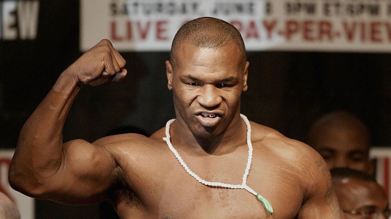 Heavyweight challenger Mike Tyson makes a fist during the weigh-in 06 June 2002 in Memphis, Tennessee. Tyson will face defending champion Lennox Lewis for 