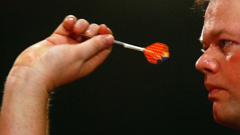 FRIMLEY GREEN, ENGLAND - JANUARY 9:  Raymond Van Barneveld of Holland in action against Martin Adams of England during the final of The British Darts Organ