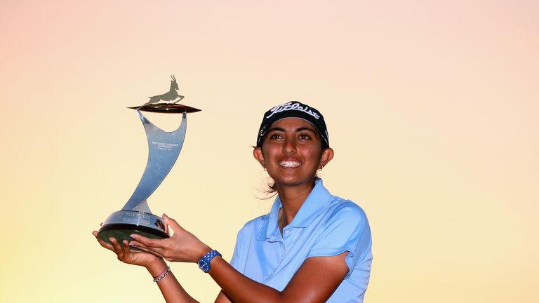 ABU DHABI, UNITED ARAB EMIRATES - NOVEMBER 04:  Aditi Ashok of India poses with the trophy following her victory during Day Four of the Fatima Bint Mubarak