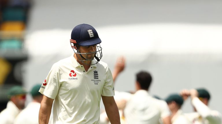 Alastair Cook walks off after being dismissed by Mitchell Starc