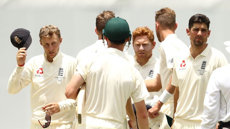 BRISBANE, AUSTRALIA - NOVEMBER 27: Joe Root. Jonny Bairstow and Alastair Cook of England look on after day five of the First Test Match of the 2017/18 Ashe