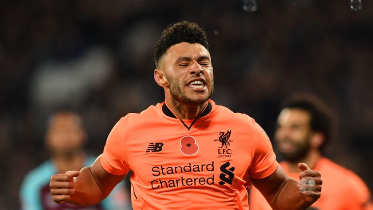 Alex Oxlade-Chamberlain celebrates after scoring Liverpool's third goal at the London Stadium