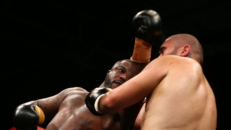AUCKLAND, NEW ZEALAND - JUNE 04:  Alonzo Butler (L) throws a punch during the 'SUPER 8: Last Man Standing' bout between Alonzo Butler and Brice Ritani-Coe 