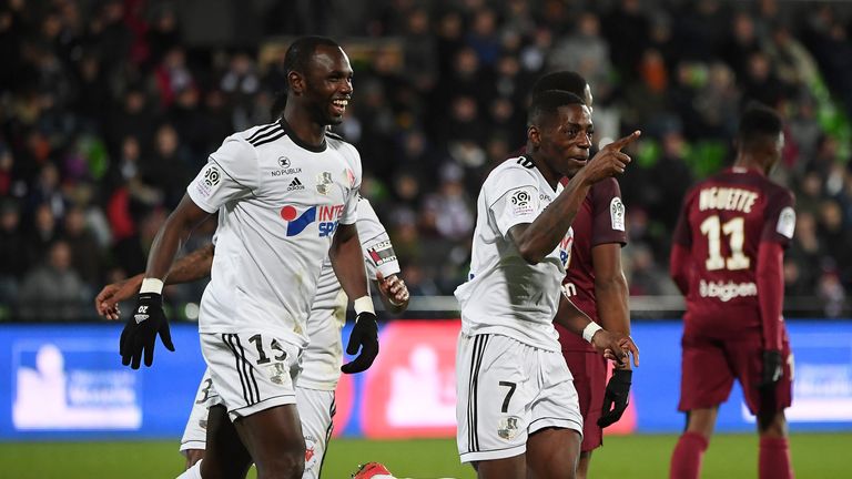 Amien's Moussa Konate (L) celebrates with teammate Harisson Manzala after scoring a goal during the French L1 football match Metz (FC Metz) vs Amiens on No