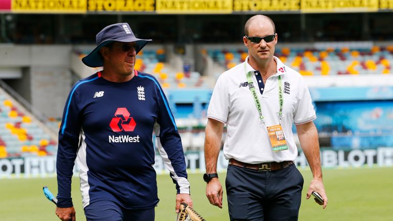ECB Director Andrew Strauss (right) walks alongside Head coach Trevor Bayliss during a nets session at The Gabba, Brisbane.