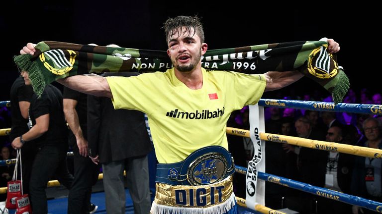 Swedish boxer Anthony Yigit celebrates his victory over Spanish boxer Sandor Martin at the end of their European Super Lightweight title clash