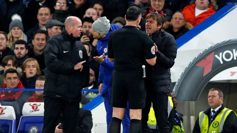 Antonio Conte remonstrates with referee Neil Swarbrick before being sent to the stands