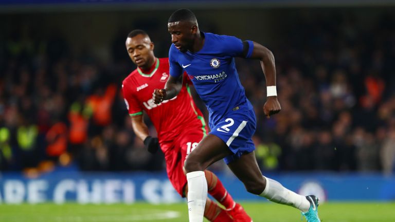 LONDON, ENGLAND - NOVEMBER 29: Antonio Rudiger of Chelsea takes the ball away from Jordan Ayew of Swansea City during the Premier League match between Chel