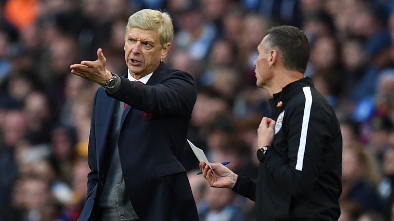 Arsenal's manager Arsene Wenger was fuming with the officials after his side's 3-1 defeat by Man City