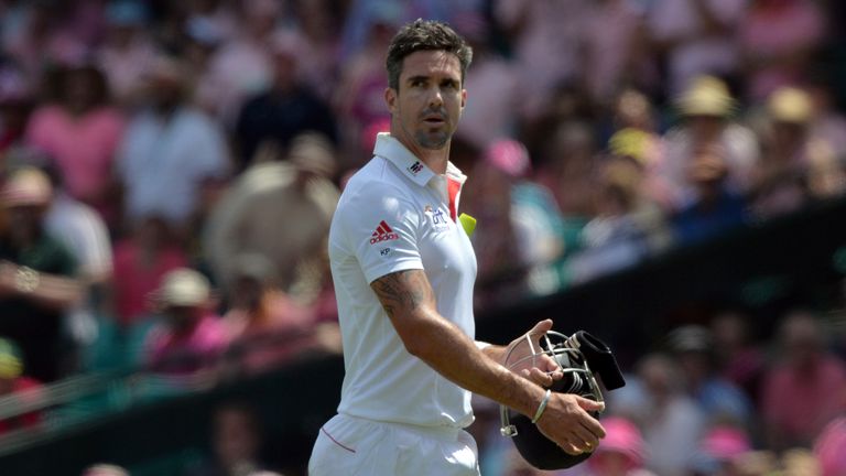 England's batsman Kevin Pietersen walks back towards the dressing room following his dismissal off the bowling of Ryan Harris on the third day of the fifth