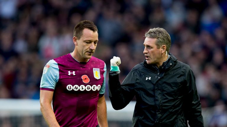John Terry leaves the pitch at Villa park after suffering an injury