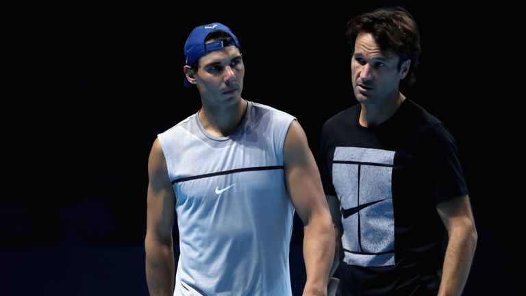 Rafael Nadal of Spain (L) and coach Carlos Moya (R) during a training session prior to the Nitto ATP Finals