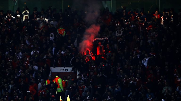 Fans set off a flare in the stands during the UEFA Champions League, Group A match at Old Trafford, Manchester.