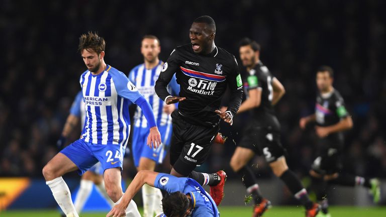 BRIGHTON, ENGLAND - NOVEMBER 28:  Christian Benteke of Crystal Palace battles with Lewis Dunk and Davy Propper of Brighton and Hove Albion  during the Prem