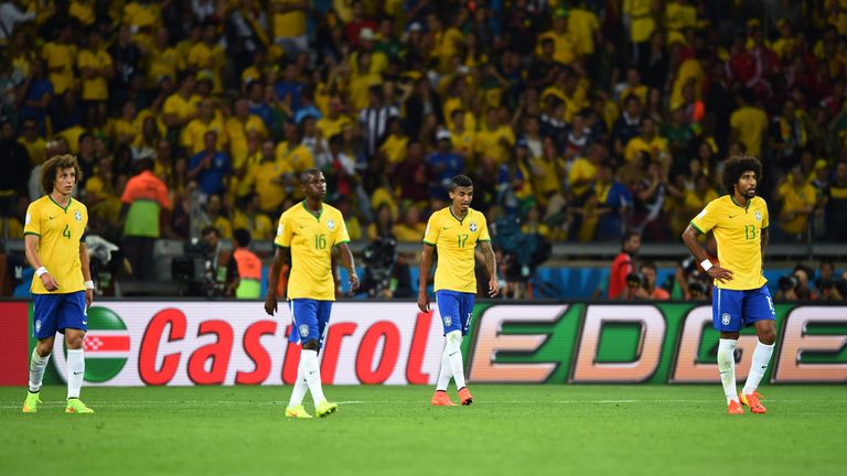 BELO HORIZONTE, BRAZIL - JULY 08:  (L-R) David Luiz, Ramires, Luiz Gustavo and Dante of Brazil look dejected after allowing a goal  braduring the 2014 FIFA