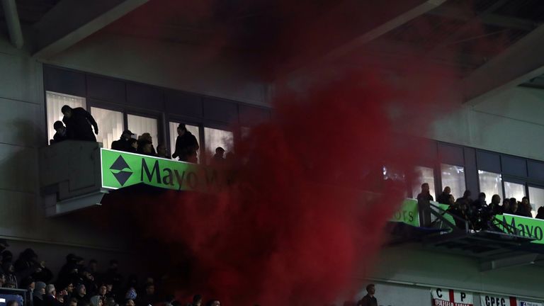 BRIGHTON, ENGLAND - NOVEMBER 28:  A flare is set off during the Premier League match between Brighton and Hove Albion and Crystal Palace at Amex Stadium on