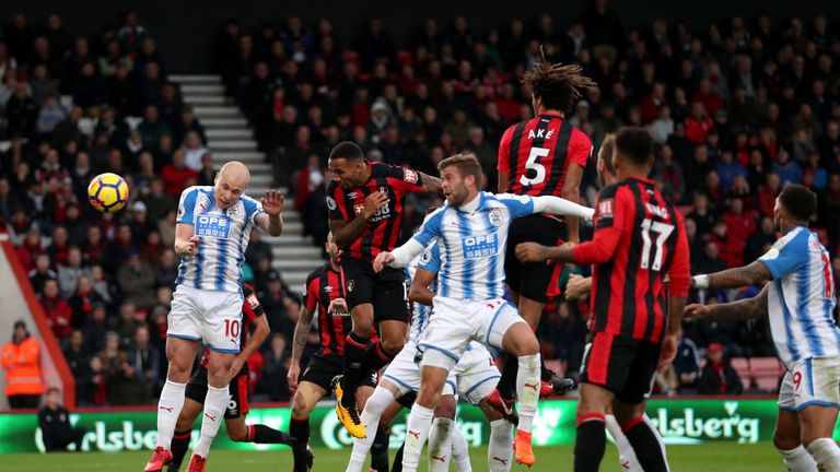  Callum Wilson heads home Bournemouth's opening goal against Huddersfield