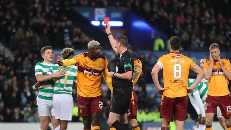 GLASGOW, SCOTLAND - NOVEMBER 26: Cedric Kipre of Motherwell gets sent of for a foul in the penalty during the Betfred Cup Final at Hampden Park on November