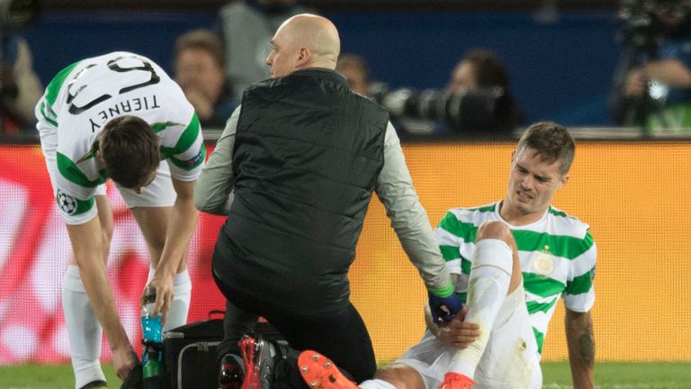 Mikael Lustig was forced to come off during the first-half of Celtic's defeat in Paris  