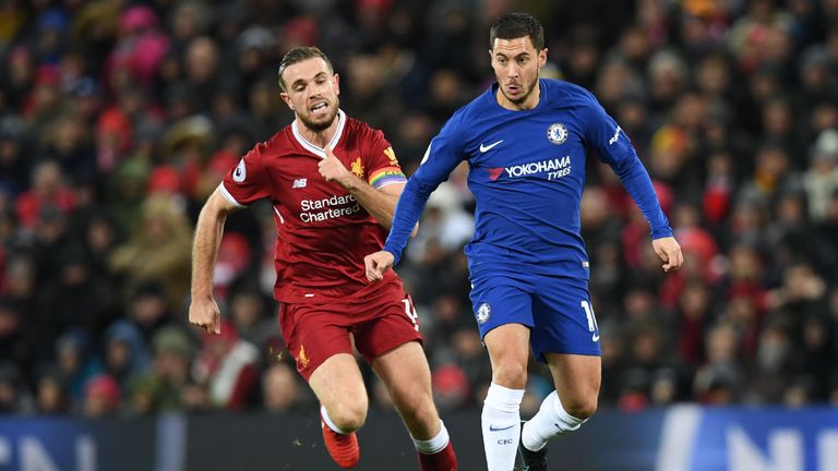 Chelsea's Belgian midfielder Eden Hazard (R) runs away from Liverpool's English midfielder Jordan Henderson during the English Premier League football matc