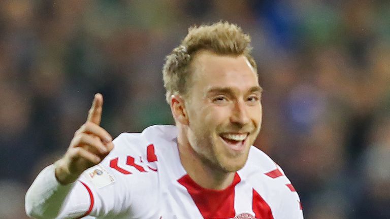 Denmark's midfielder Christian Eriksen celebrates