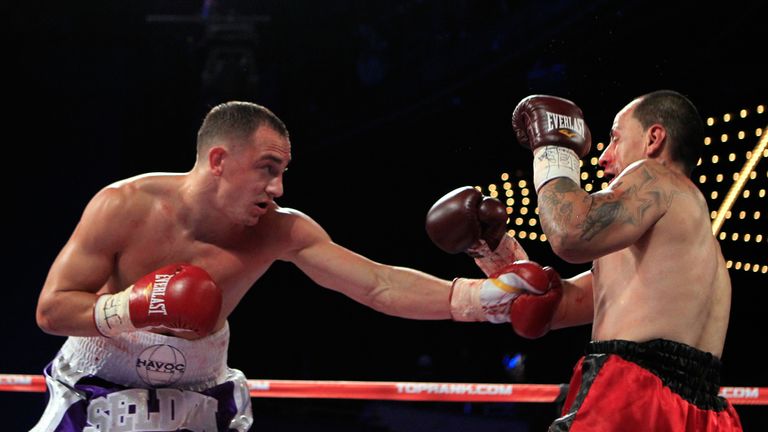 (L-R) Cletus Seldin punches Jose Segura during a welterweight bout at Madison Square Garden on October 22, 2011 in New York Citty