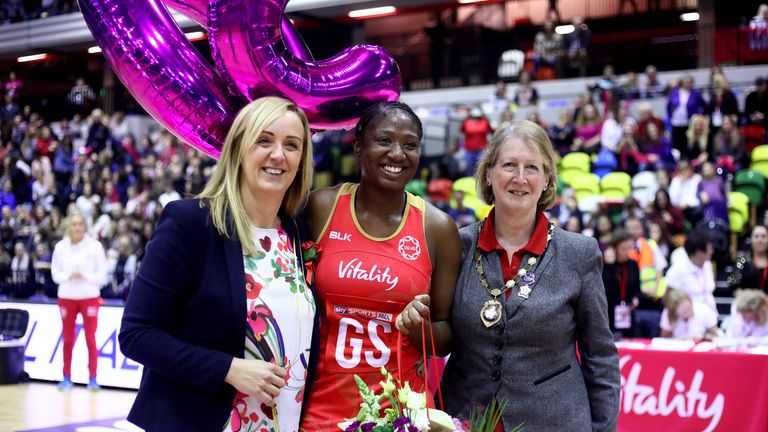 LONDON, ENGLAND - NOVEMBER 26: England's Kadeen Corbin celebrates her fiftieth cap with Head Coach Tracy Neville and Lindsey Sartori during the Vitality Ne