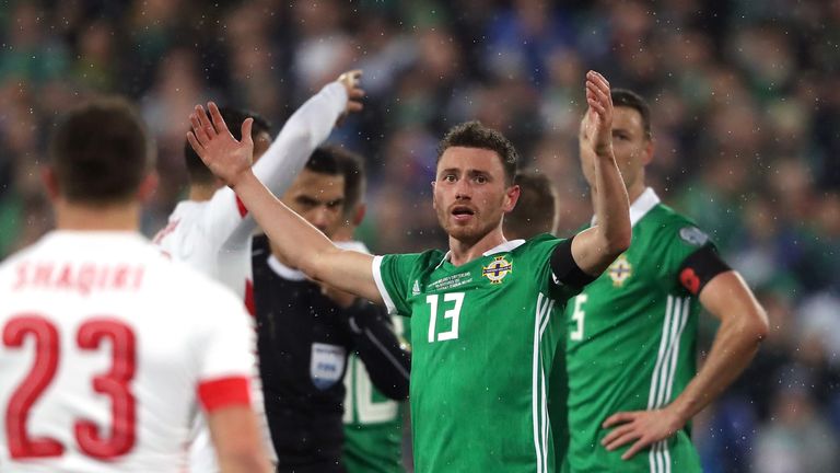 Northern Ireland's Corry Evans reacts after conceding a penalty for handball in the World Cup Qualifying Play-Off, First Leg v Switzerland, Windsor Park