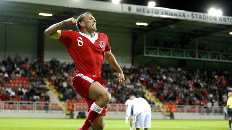 Wales' Craig Bellamy celebrates after Slovakia's Jan Durica scores an own goal during the UEFA European Championship Qualifying match at the Anton Malatins