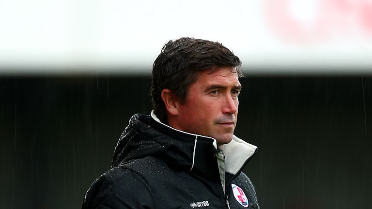 CRAWLEY, WEST SUSSEX - JULY 22:  Harry Kewell, manager of Crawley Town looks on during the Pre Season Friendly match between Crawley Town and Brighton & Ho