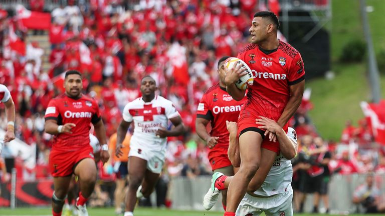  Daniel Tupou looks for support against England