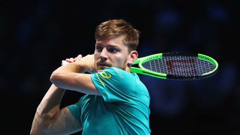 David Goffin of Belgium plays a backhand in his Singles match against Dominic Thiem of Austria