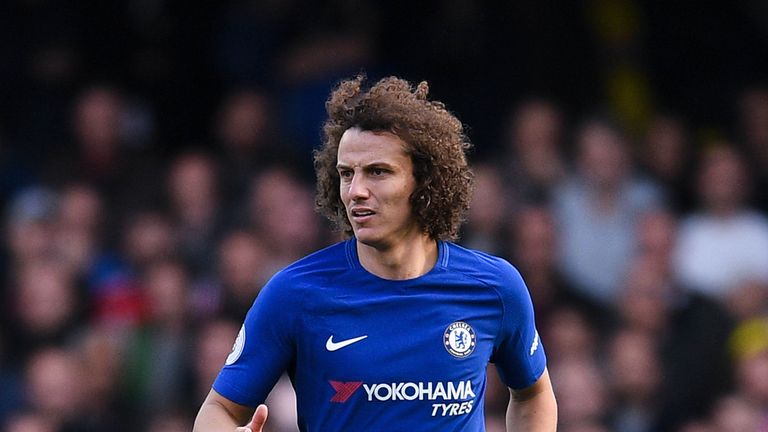 LONDON, ENGLAND - OCTOBER 21:  David Luiz of Chelsea runs with the ball during the Premier League match between Chelsea and Watford