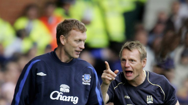 Manager of Manchester City, Stuart Pearce jokes with David Moyes the manager of Everton in 2006