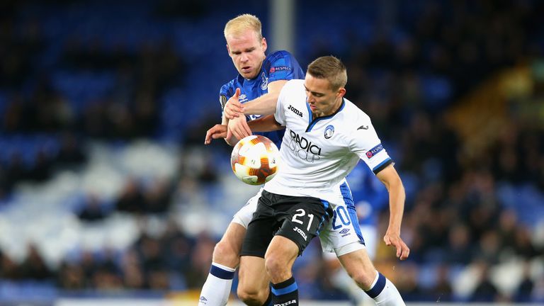 Everton midfielder Davy Klaassen and Atalanta's Timoty Castagne battle for possession 