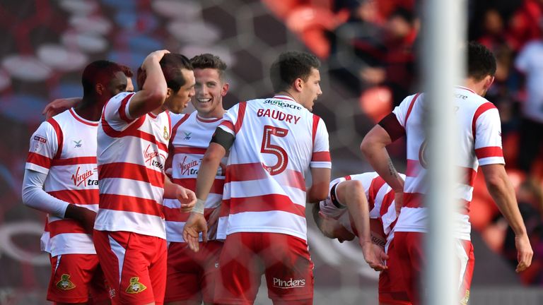 Doncaster Rovers players celebrate after Rotherham United's Richard Wood scored an own goal, Sky Bet League One, 11 November 2017