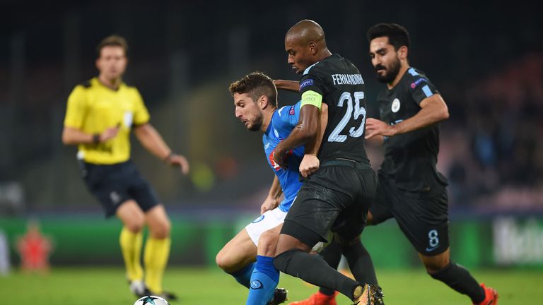Dries Mertens battles with Fernandinho during the UEFA Champions League football match between Napoli and Manchester City
